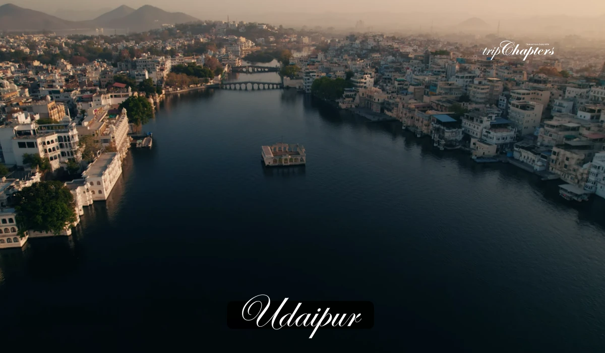 Aerial view of Udaipur city and lake at dusk