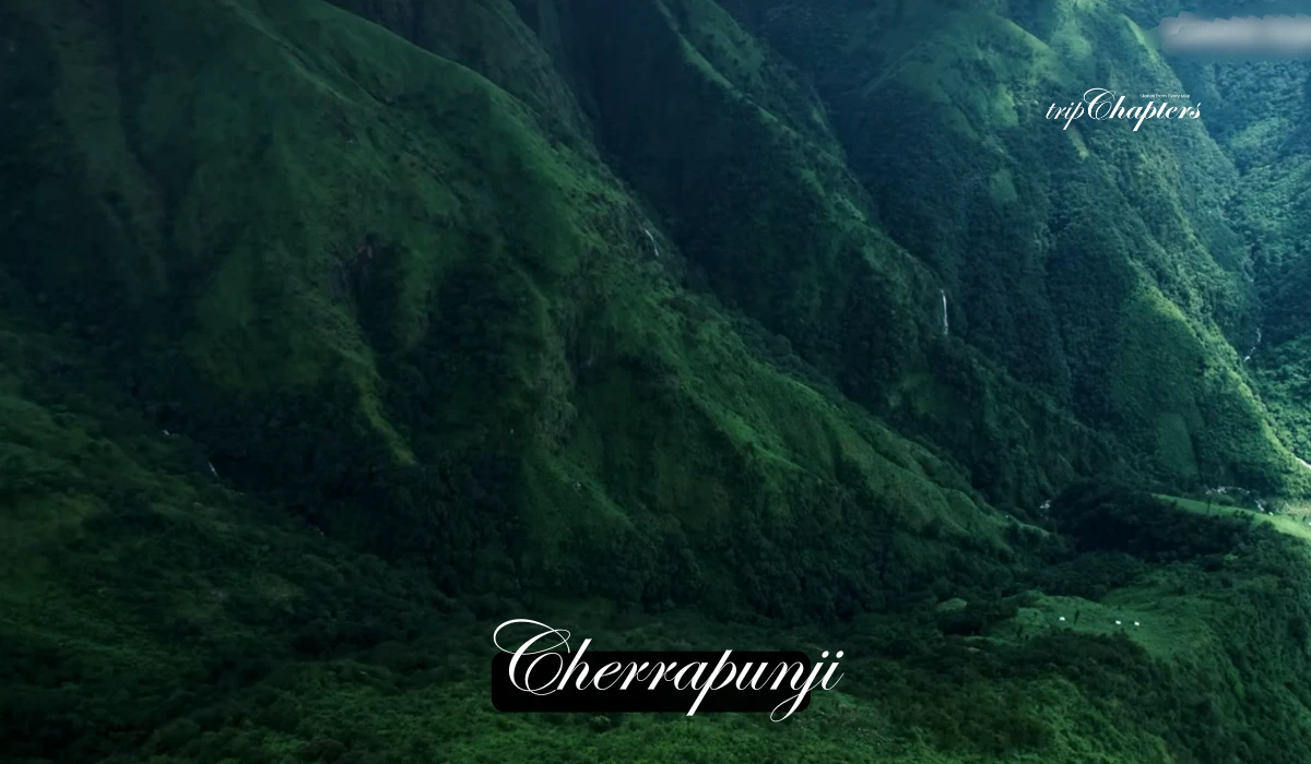 Lush green valleys and distant waterfalls in Cherrapunji