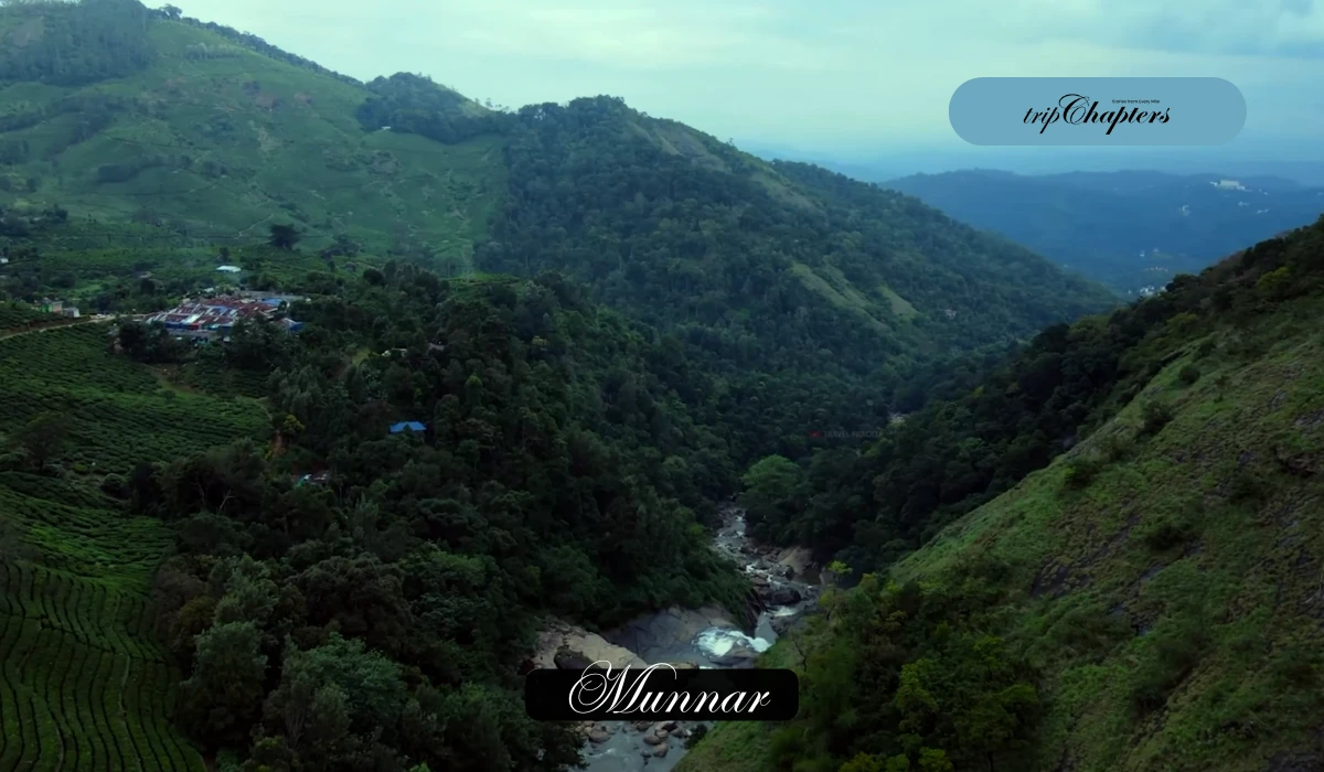 Monsoon winding river flowing through a deep green valley surrounded in Munnar